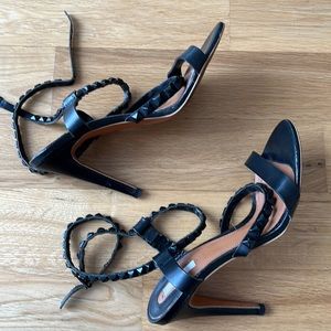 EVENING HEELS with studded straps.